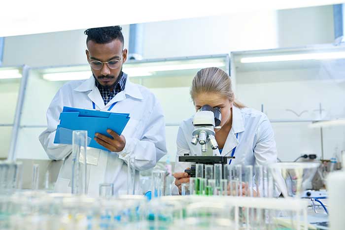 Male and female lab technicians